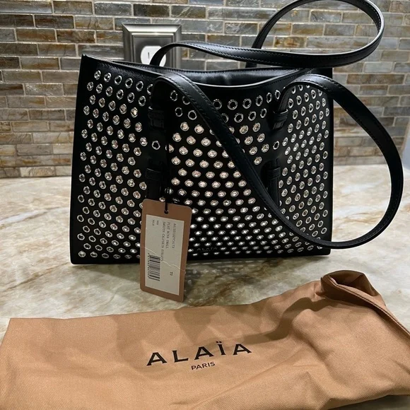 ALAÏA Mina Small perforated leather tote bag - Picture 13 of 14